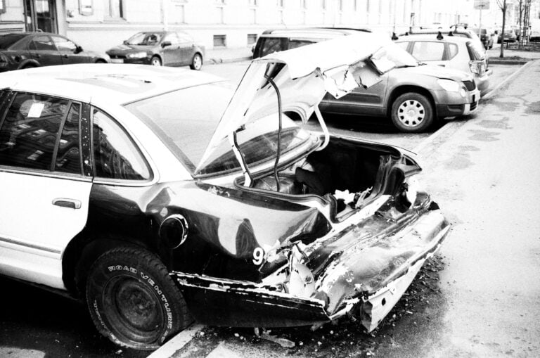 The trunk of a car wrecked after a car accident. Virginia car accident attorney concept